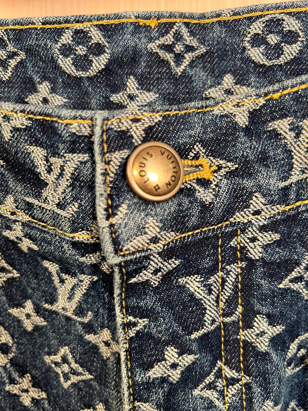 Louis Vuitton denim front button with logo stamp on monogram pattern