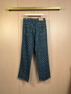 Louis Vuitton monogram denim pants on hanger, dark blue with logo repeat print