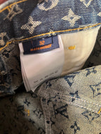 Louis Vuitton denim size tag reading 32, Made in Italy on monogram lining
