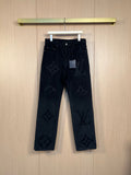 Dark denim pants with all-over monogram print, straight leg cut