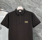 Gucci polo shirt, black short-sleeve with button placket and logo patch