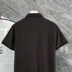 Gucci polo shirt, black short-sleeve with textured interlocking pattern, back view