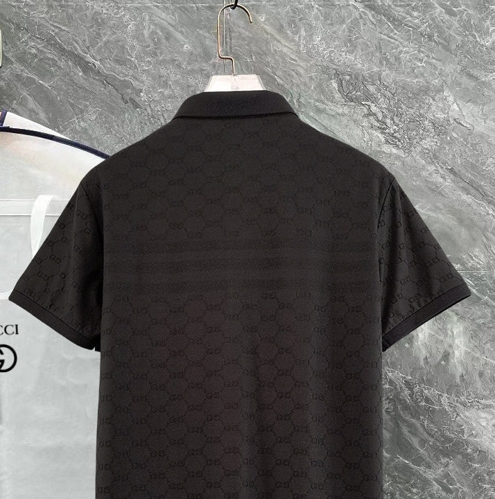 Gucci polo shirt, black short-sleeve with textured interlocking pattern, back view