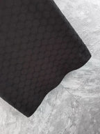 Gucci polo shirt sleeve, black with textured interlocking pattern