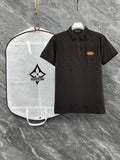 Black monogram polo shirt with button placket and chest patch