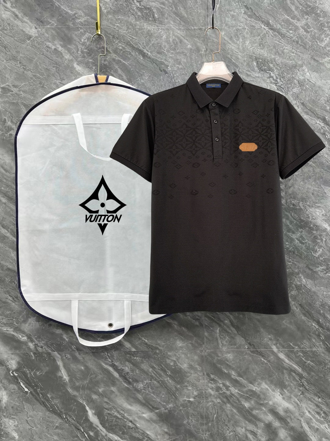 Black monogram polo shirt with button placket and chest patch