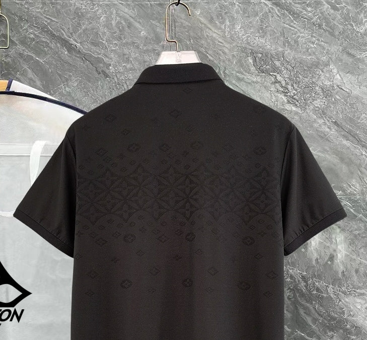 Black polo shirt close-up back with short sleeves and textured monogram pattern