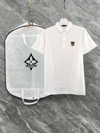 Louis Vuitton polo shirt set: white short-sleeve polo, front view with small chest emblem