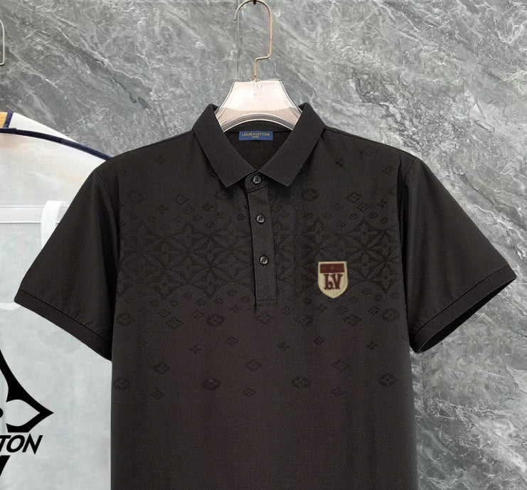 Louis Vuitton black polo shirt, front close-up with button placket and chest crest