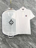 White polo shirt with short sleeves, button placket, and small chest logo patch