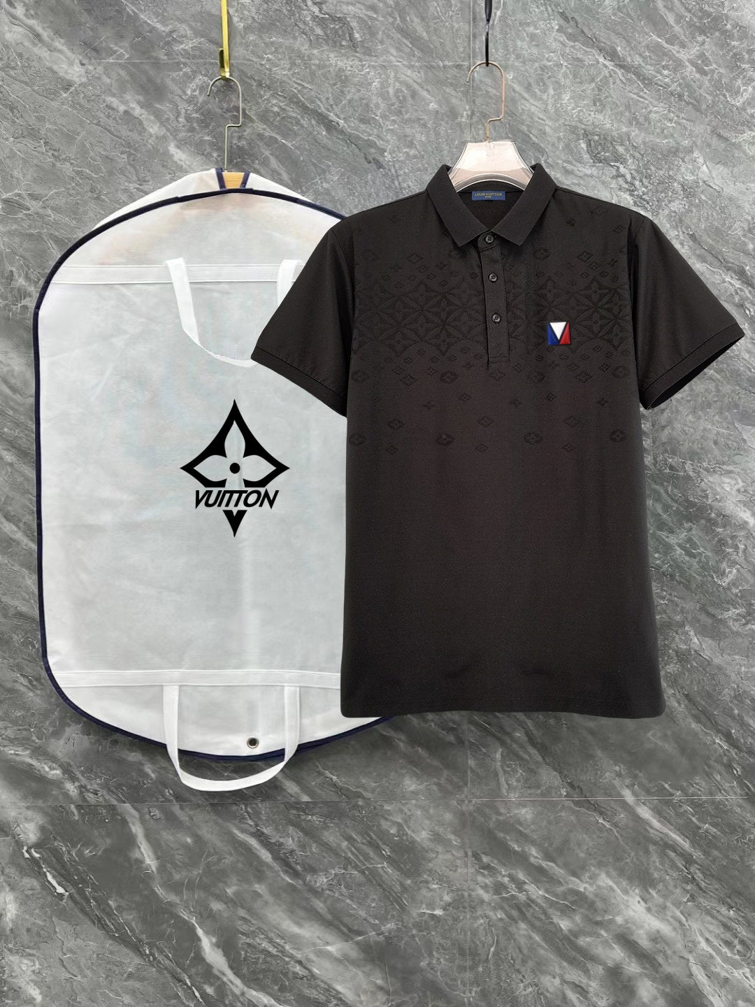 Black polo shirt with short sleeves, button placket, and chest logo patch