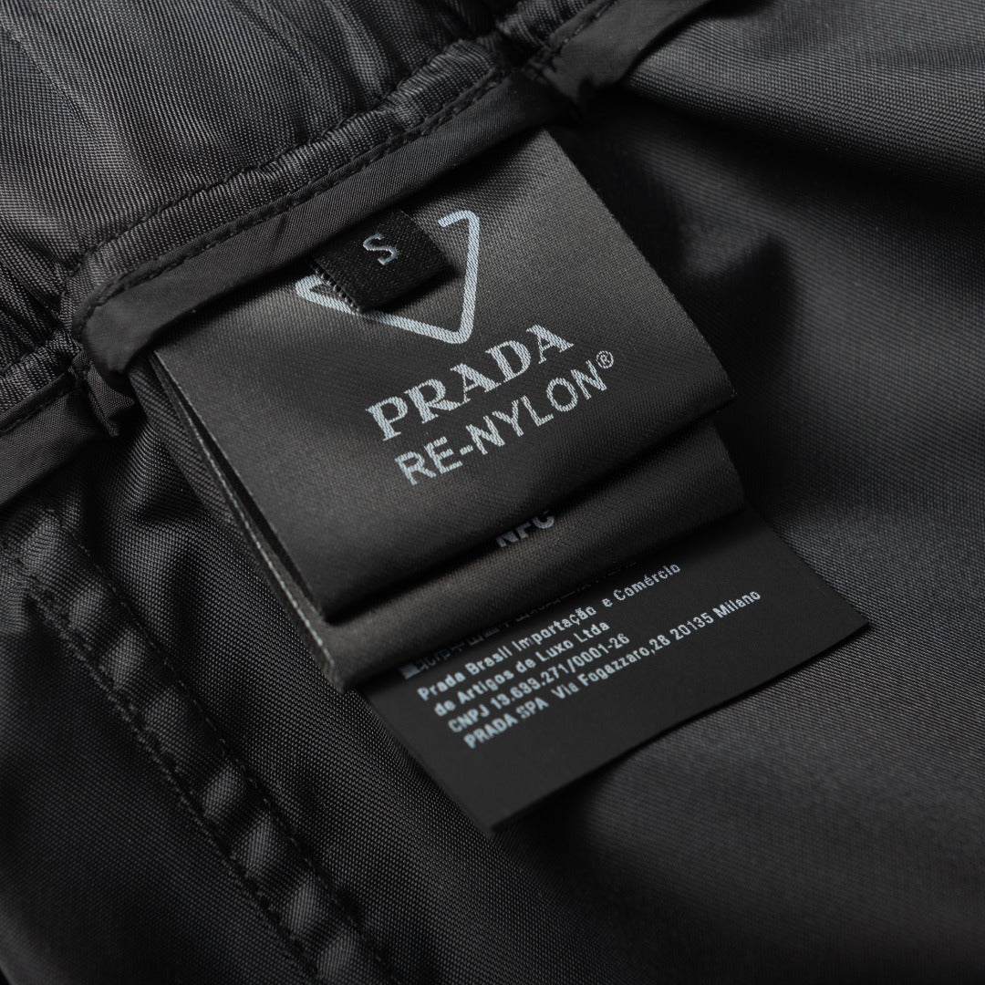 Prada nylon garment label on black fabric