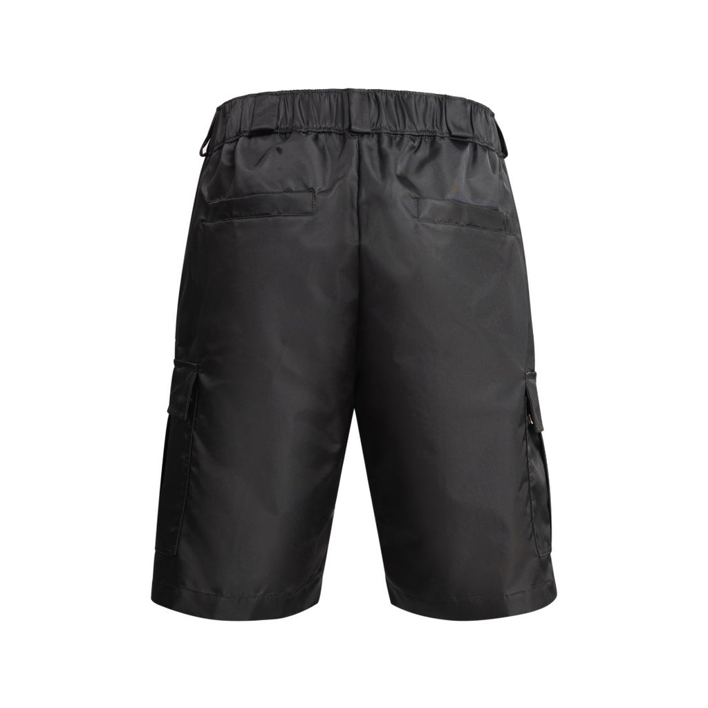 Prada black nylon pants, back view with elastic waistband and side cargo pockets