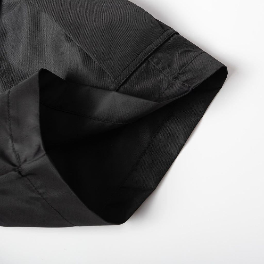 Prada black nylon pants leg with stitched cargo pocket detail