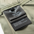 Olive Prada care label and “PRADA RE-NYLON” tag inside waistband