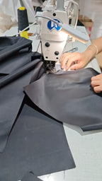 Dark gray cargo pants with belt loops and side pockets