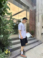 Black knee-length shorts, side view