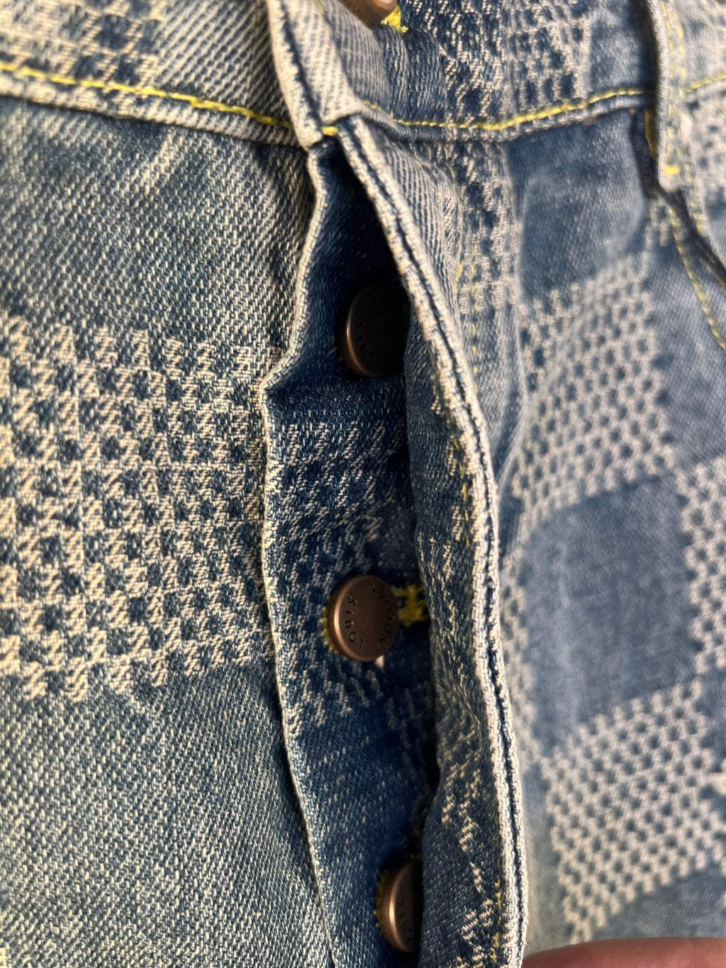 Denim shorts pants side tab with bronze snap buttons and pocket opening