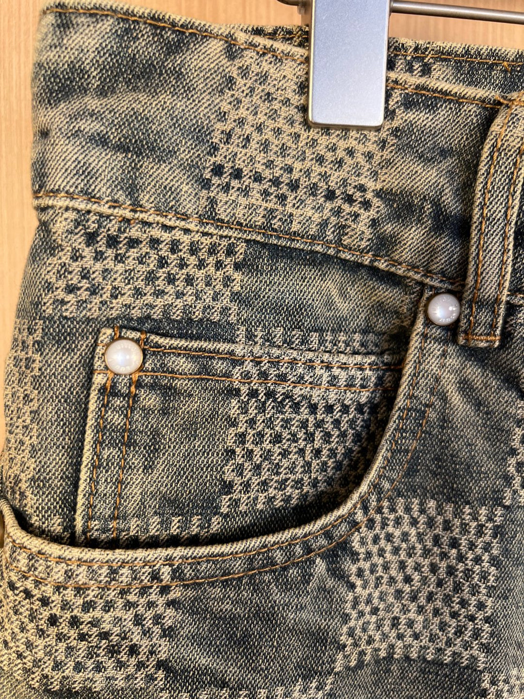 Denim pants with two patch pockets and pearl-style buttons, check pattern