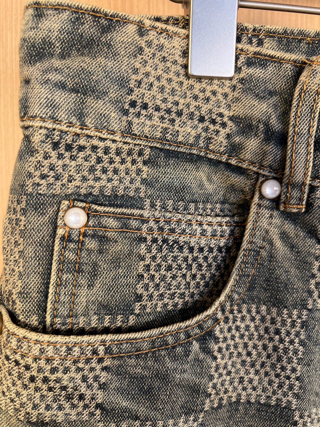 Denim pants with two patch pockets and pearl-style buttons, check pattern
