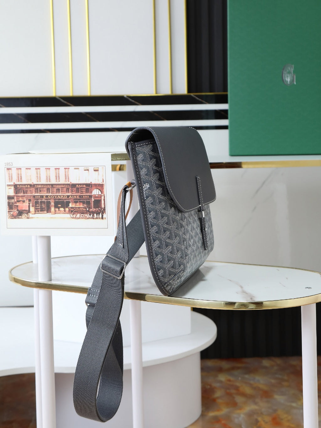 Goyard crossbody bag in dark gray monogram canvas with curved top flap and long strap