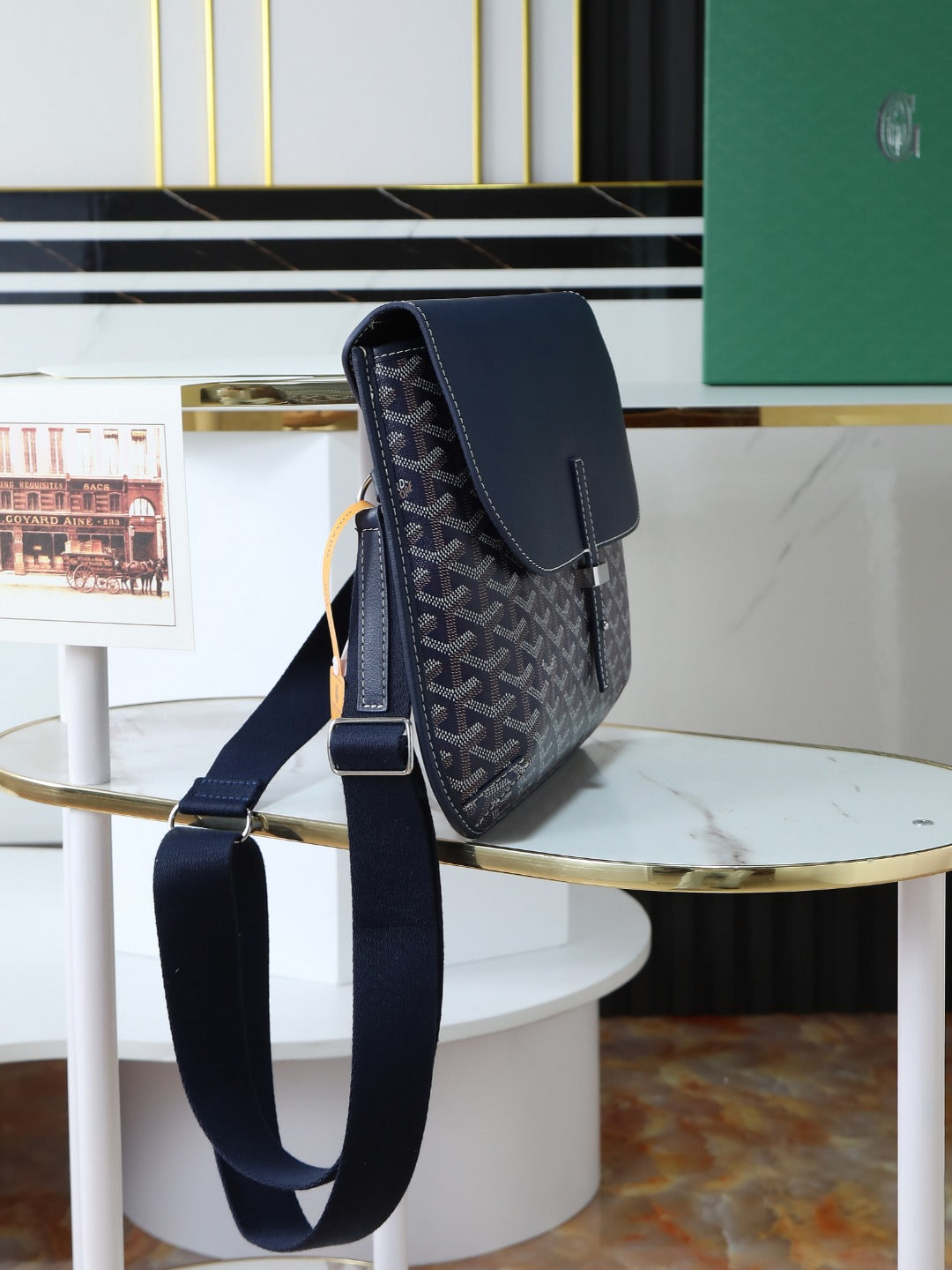 Goyard crossbody bag on strap in dark blue with monogram canvas and flap
