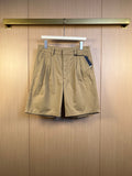 Khaki Prada shorts with belt loops, front pleats, and side pockets