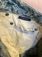 Interior care label on light denim pants with button placket detail