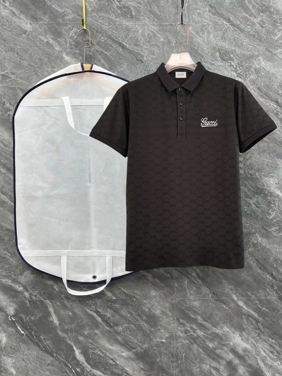 Black Gucci polo shirt with short sleeves, collar, button placket, script logo