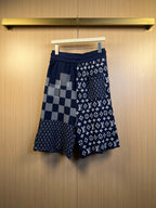 Navy Louis Vuitton shorts with checker and monogram prints, elastic waist