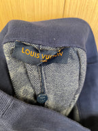 Navy shorts with Louis Vuitton label inside waistband