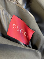 Gucci red interior label on dark blazer lining