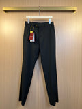 Gucci black dress trousers with button waist and hanging price tag