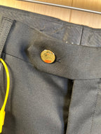 Gucci trousers waistband close-up with button closure and belt loops