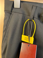Gucci trousers front pocket area with belt loops and hanging tag