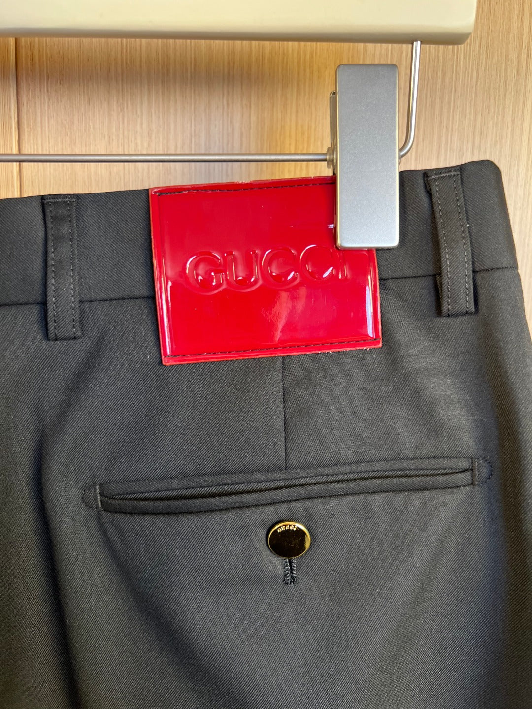 Gucci trousers waist with coin emblem button and belt loops