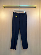 Gucci dark navy pants with belt loops, front button closure and side pockets