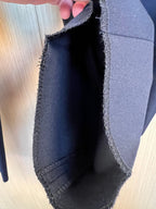 Dark navy pant leg opening with frayed cuff trim