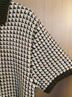 Louis Vuitton knit sleeve, black green base with white and tan houndstooth pattern