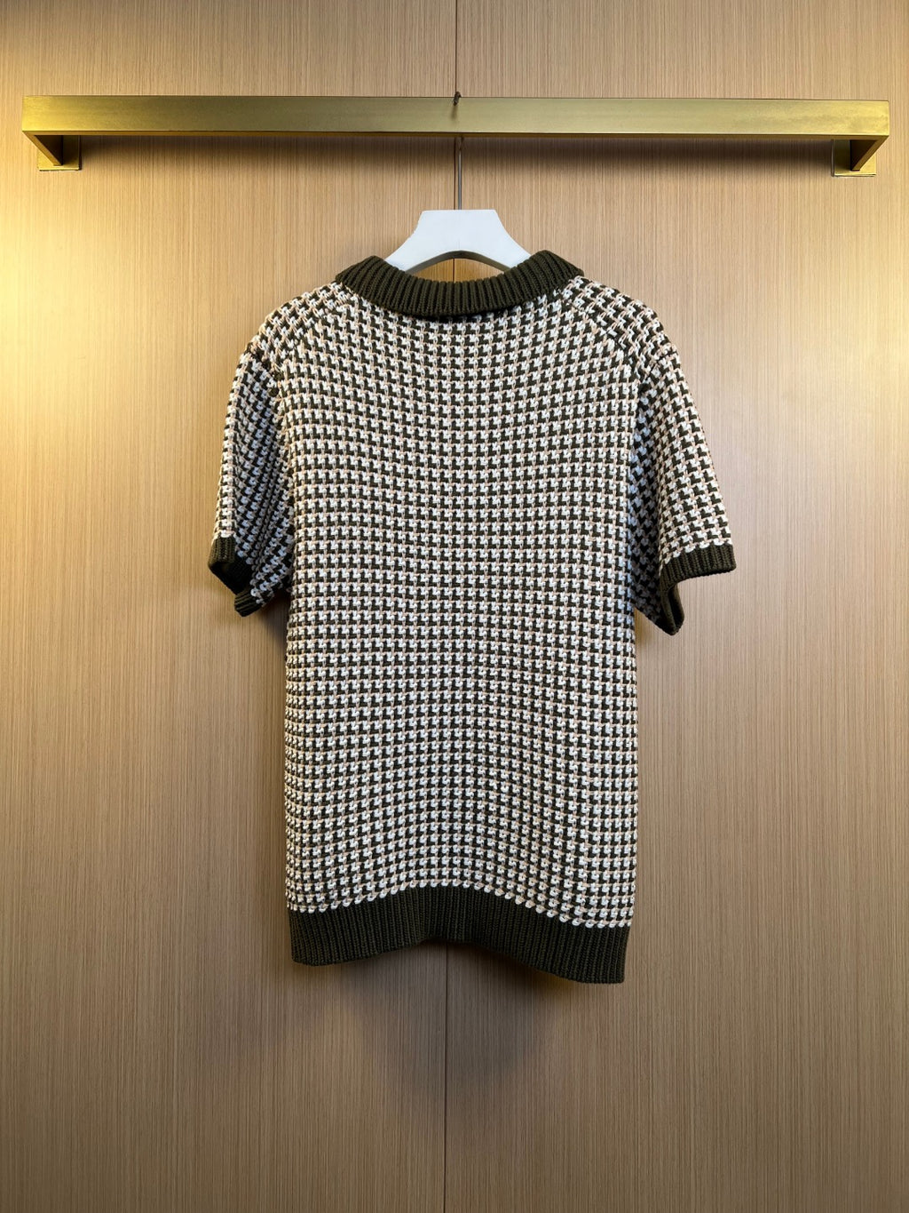 Louis Vuitton knit polo shirt back view, black and white patterned with ribbed hem