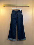Louis Vuitton wide-leg denim pants with patterned inner hem and metal buttons