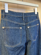 Denim pants back view with two pockets and contrast yellow topstitching