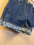 Louis Vuitton denim shorts front with pocket stitching and monogram cuff hem