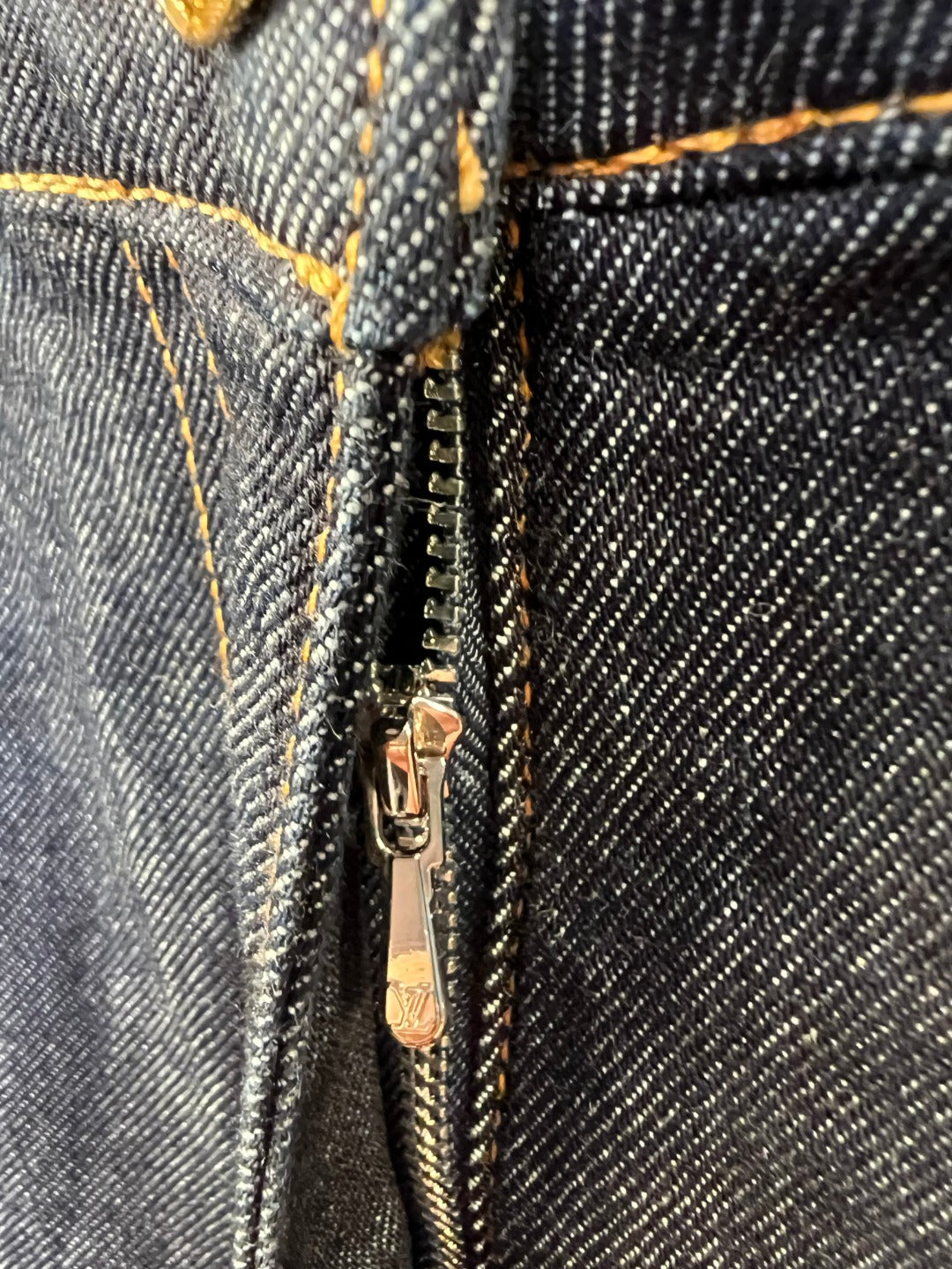 Louis Vuitton denim shorts zipper fly with metal pull and contrast seams