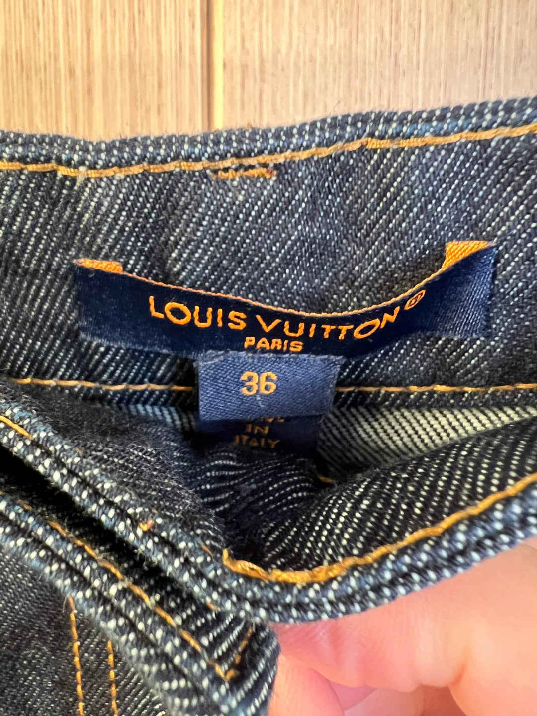Louis Vuitton denim shorts interior label with size 36 and care text