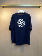 Navy knit polo shirt with large back crest graphic