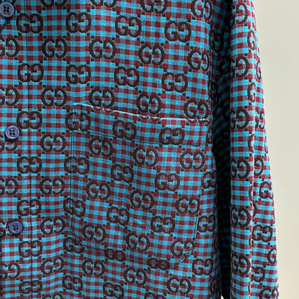 Long-sleeve shirt front with blue Gucci GG check pattern and round buttons