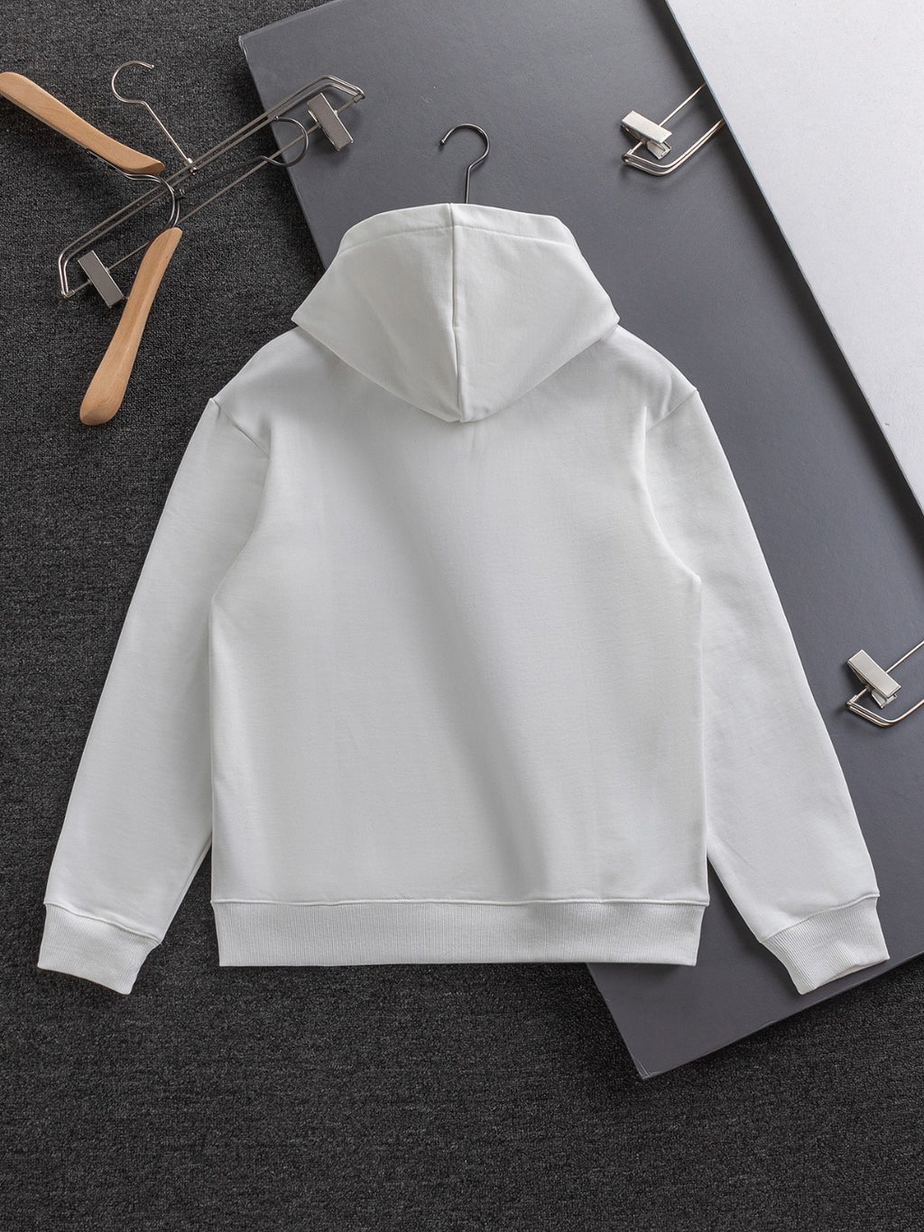 White Dior hoodie sweatshirt with hood, back view on hanger