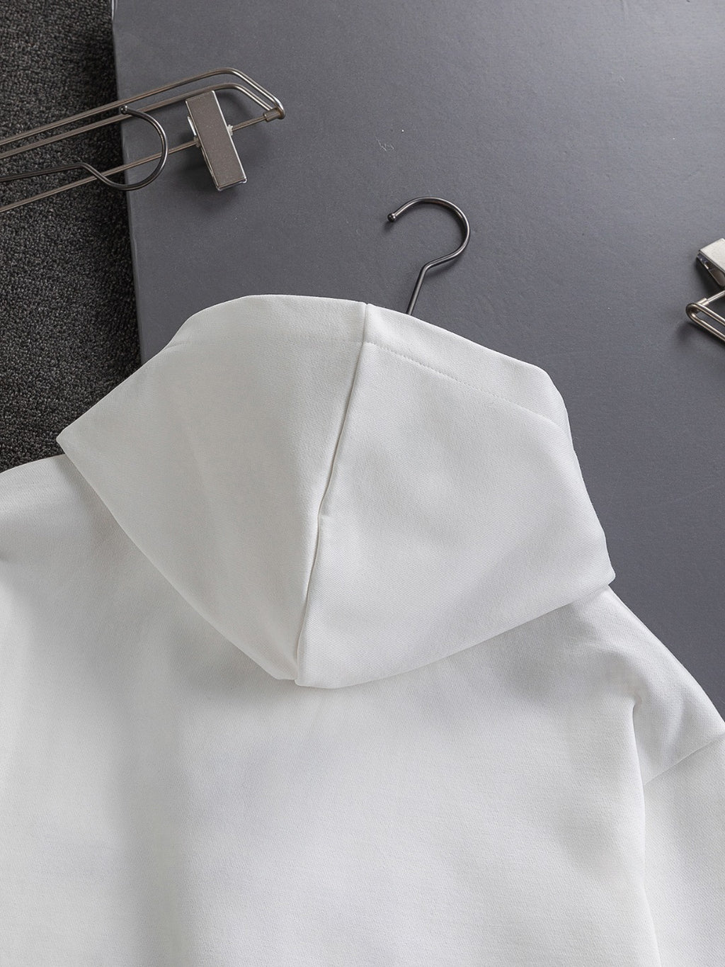 White Dior hoodie sweatshirt with hood and curved back seam detail