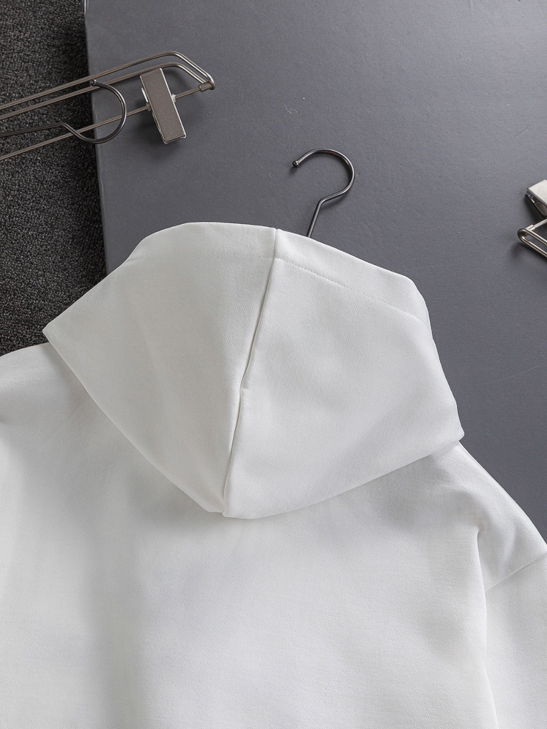 White Dior hoodie sweatshirt with hood and curved back seam detail